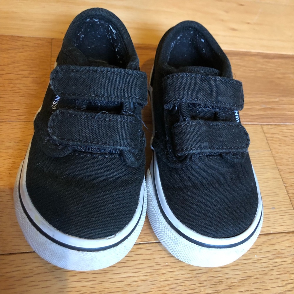 Black and white Toddler Vans size 5